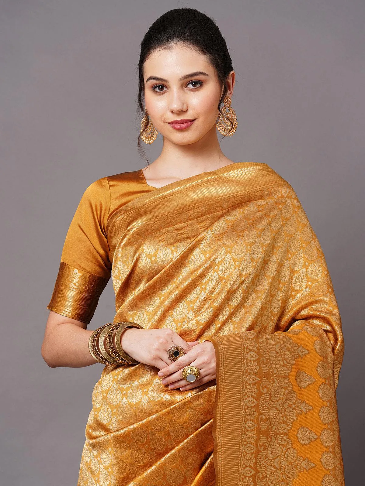 Odette Women Mustard Festive Silk Blend Woven Design Saree With Unstitched Blouse